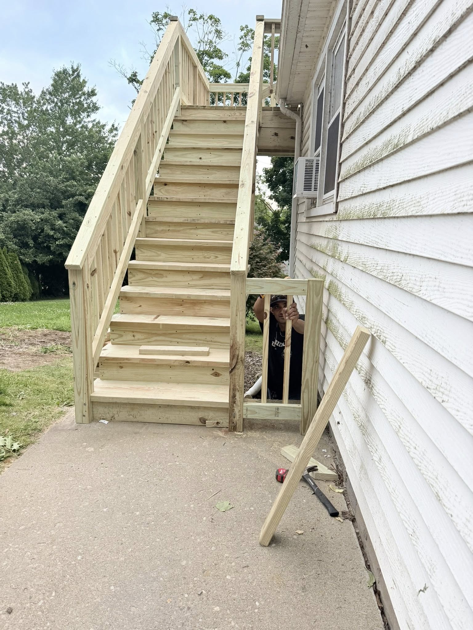 New staircase framing complete — pressure treated lumber Westchester