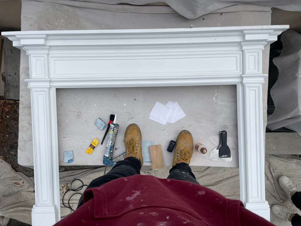 Mantel being installed on site