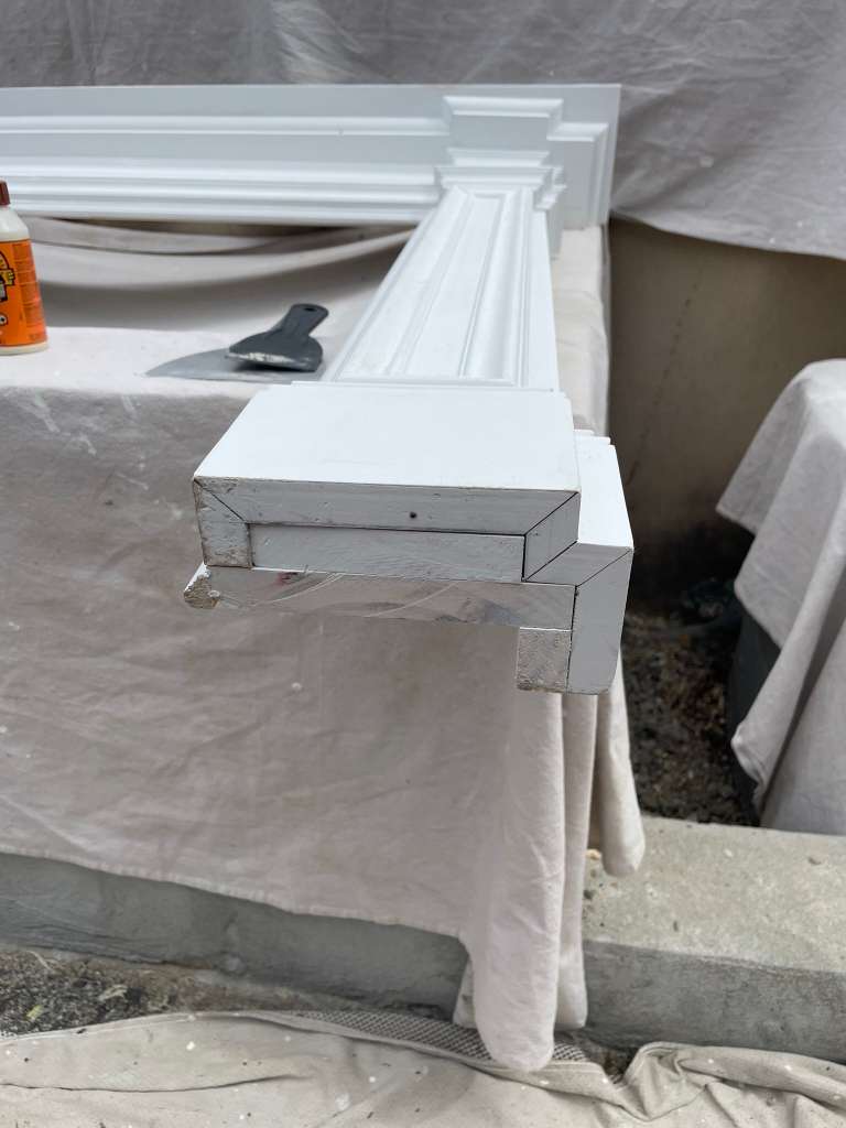 Crown molding profile fitted to the mantel shelf — custom fireplace mantel, Westchester NY