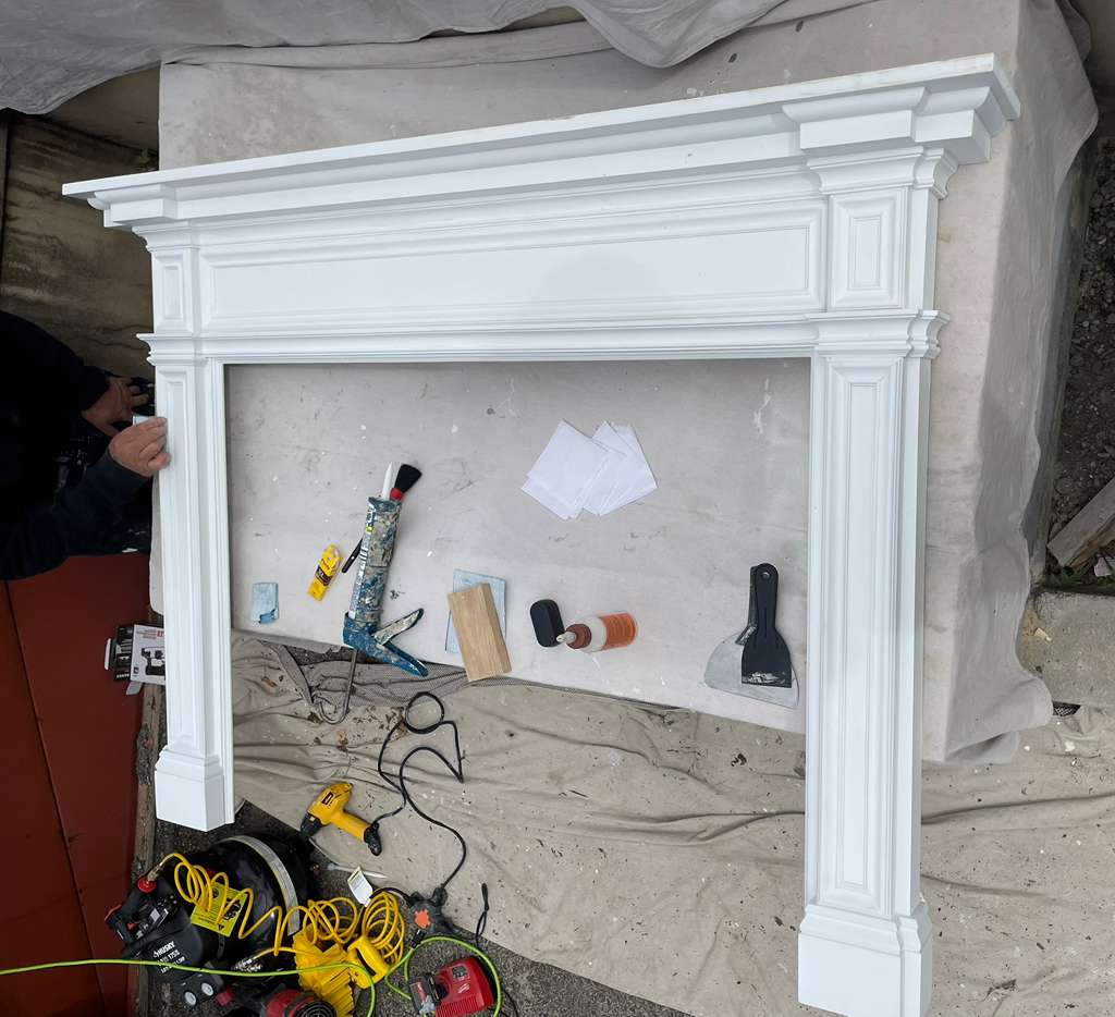 Assembled mantel standing, primed and ready for topcoat — custom fireplace mantel, Westchester NY