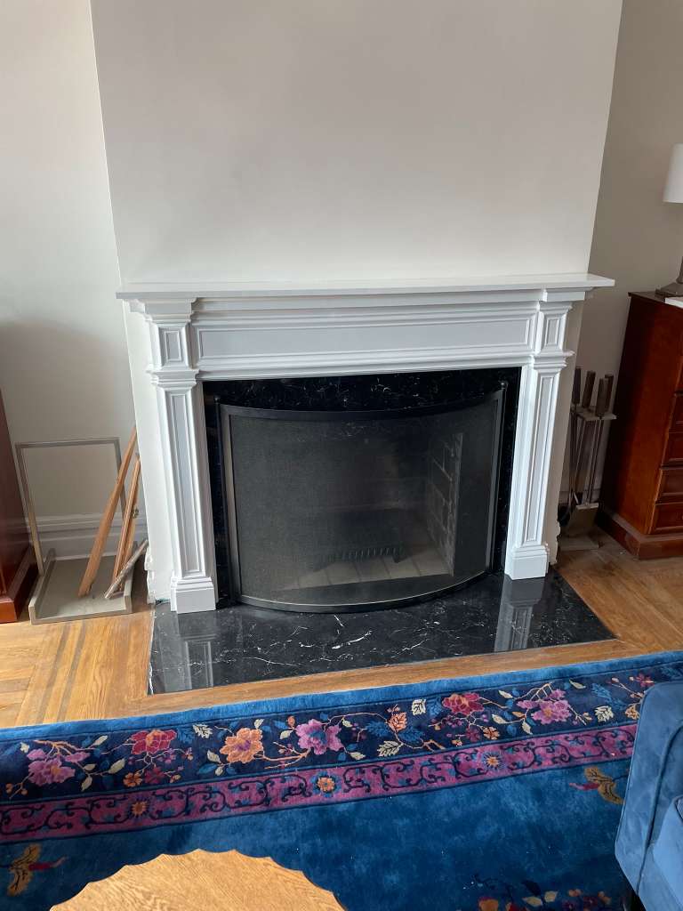 Finished mantel in the room — caulked in for a built-in look — custom fireplace mantel, Westchester NY